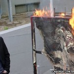 Museum director Antonio Manfredi set fire to the first painting on Tuesday. Image via BBC website